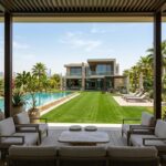 Artificial grass vs natural grass in Dubai villa garden showing green lawn and low maintenance option